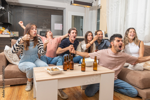 Group of friends watching a soccer match