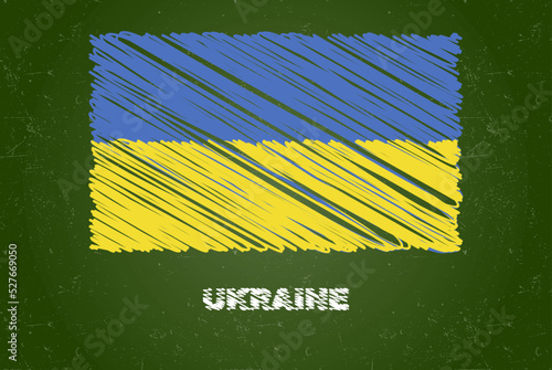 Ukraine flag with chalk effect on green chalkboard, hand drawing country flag, flag for kids, classroom material photo