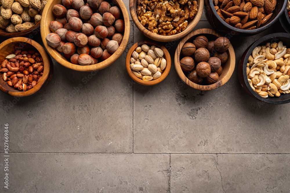 Assortment of nuts in bowls Assortment of nuts in bowls