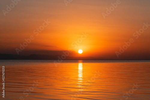 Beautiful golden sunset over the lake. Sunset landscape. © Inga Av