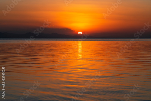 Beautiful golden sunset over the lake. Sunset landscape.