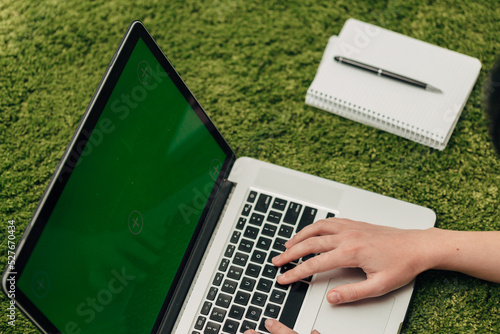 Close-Up Shot of Human Hands Placed Over Laptop