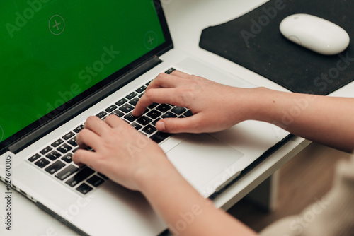 Close-Up Shot of Human Hands Placed Over Laptop