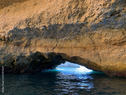 A view of beautiful sandy beach in Armacao de Pera seaside town  Algarve region  Portugal. View from a boat.