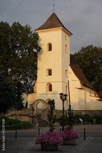 Gothic Church of St. Wojciech and Our Lady of Snow (kosciol sw. Wojciecha i Matki Boskiej Snieznej) at sunset. Mikolow, Poland. photo