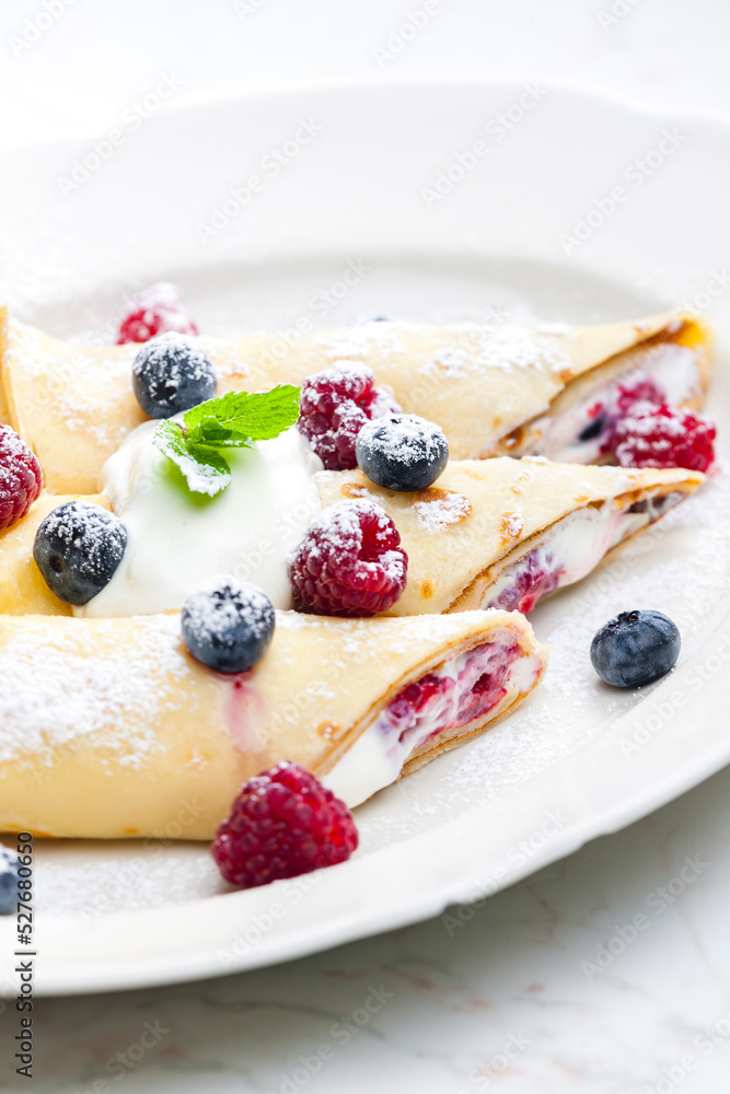 pankaces filled with blueberries, raspberries and cream pankaces filled with blueberries, raspberries and cream