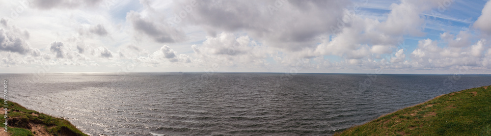 Fototapeta premium Panorama of dramatic summer cloud sky above the baltic sea seen from Ales stenar in Skåne (Scania) Sweden