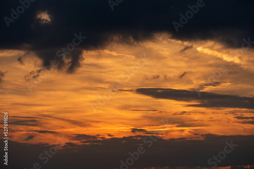 Sunset on a cloudy sky in Germany during summer