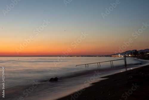 sunset on the beach © Bartu