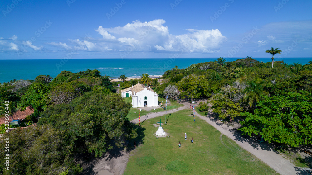Aerial view of Trancoso, Porto Seguro, Bahia, Brazil. Small chapel in the historic center of Trancoso, called Quadrado. With the sea in the background