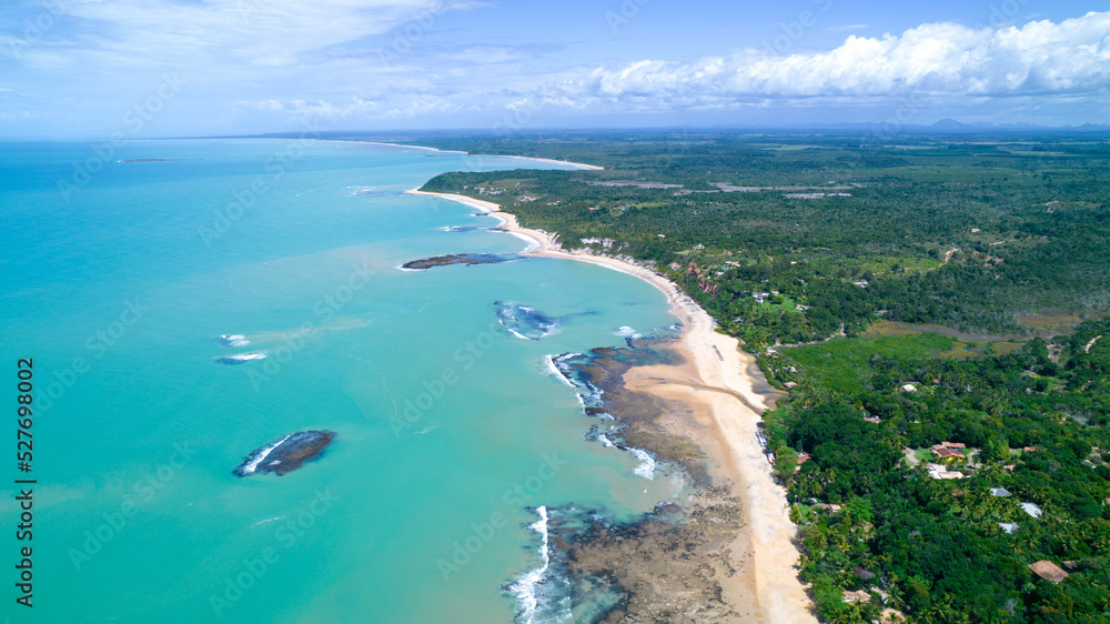 Aerial view of Praia do Espelho, Porto Seguro, Bahia, Brazil. Natural pools in the sea, cliffs and greenish water