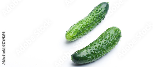 Ripe fresh green cucumber isolated on a white background