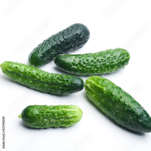 Ripe fresh green cucumber isolated on a white background