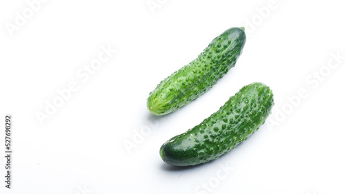 Ripe fresh green cucumber isolated on a white background