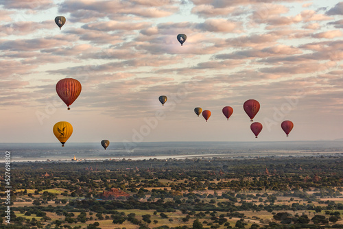 Hot air balloons fly over the mystical World Heritage Site of Bagan in Myanmar