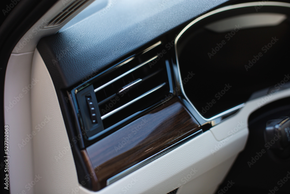 Air vent grill in luxury car. Сar air conditioner, buttons, display. Air vent grill in luxury car. Сar air conditioner, buttons, display.
