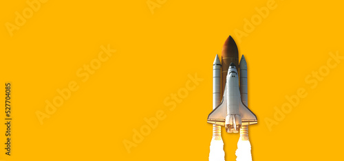 Fototapeta Naklejka Na Ścianę i Meble -  Space Shuttle isolated on yellow background. Elements of this image furnished by NASA.
