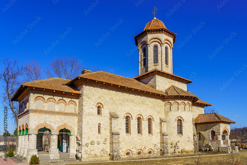 Fototapeta premium Old stone church. Background with selective focus and copy space