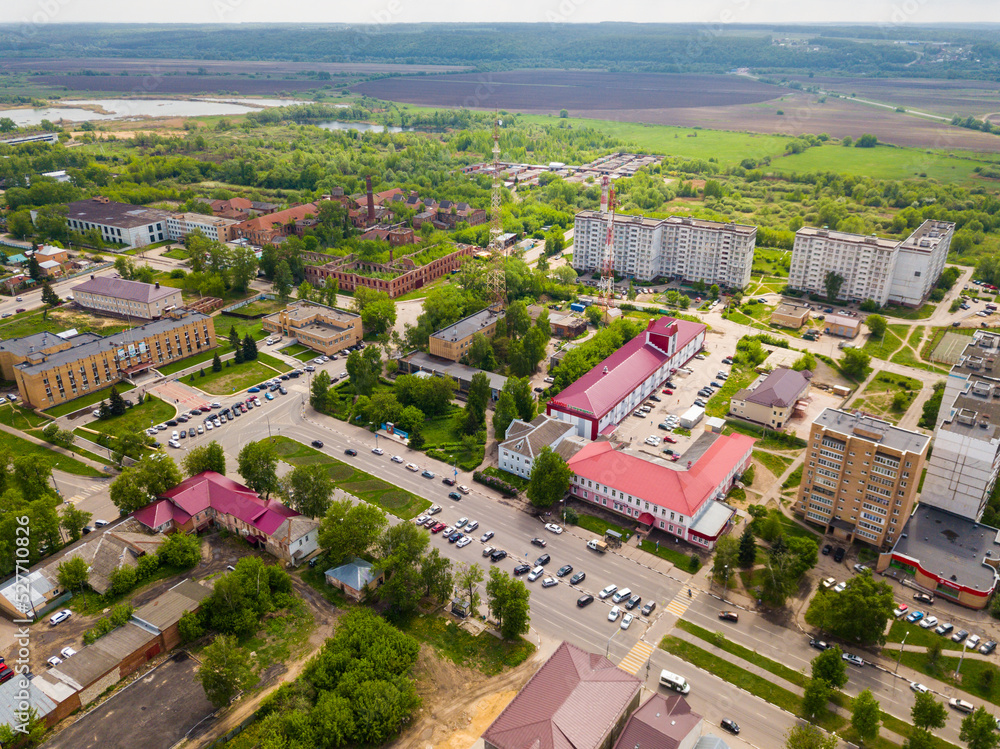 Aerial view of modern residential areas of small Russian city of Ozyory in sunny spring day