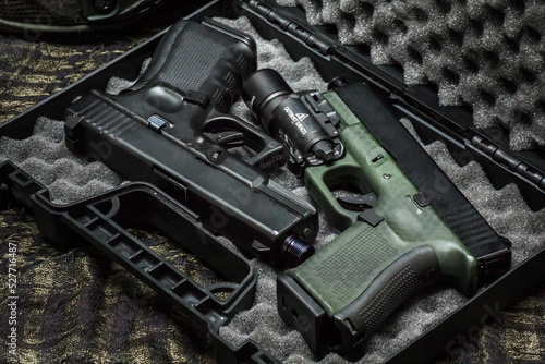 G19 gen4 and gen5 model, Pistol weapon handheld polymer pistol and popular handgun weapon with flashlight attachment olive green color and black.