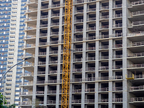 High-rise construction. Skyscraper under construction. Housing frame. Multi-apartment housing. Building cranes. Batumi. New area.