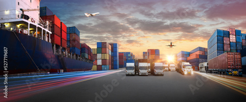 Fotografiet Container truck in ship port for business Logistics and transportation of Contai