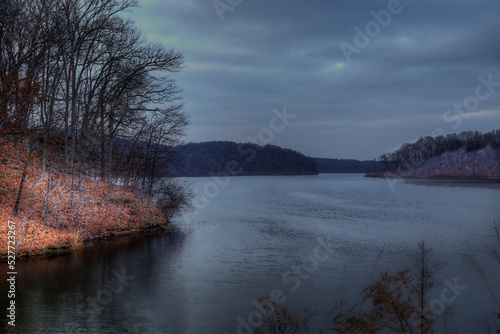 Lake Kincaid on a Winter Evening. Clouds have gathered to catch the last rays of sunshine.  photo