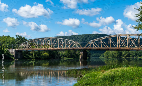 The Tidioute Bridge spanning over the Allegheny River in Warren County, Pennsylvania, USA on a sunny summer day © woodsnorth