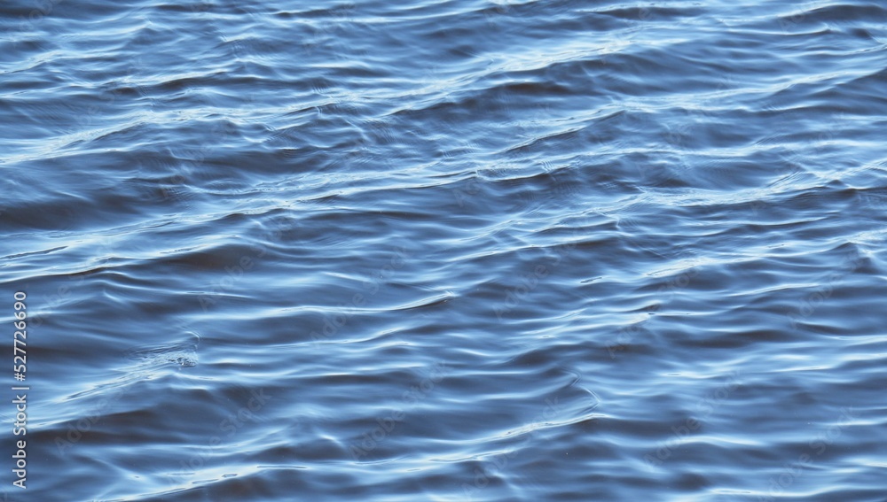 Obraz premium Closeup of blue marbled water texture, natural water background