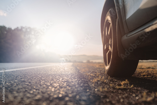 Fotobehang car tyre on the road side