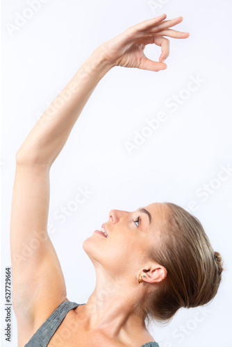 Young woman in a yoga pose in a Connecticut studio.