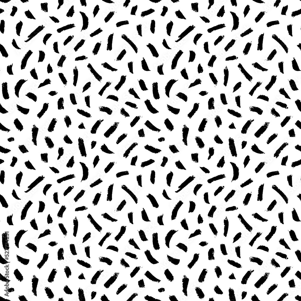 Seamless pattern with small brush strokes and dashes. Hand drawn charcoal or pencil strokes. Expressive seamless abstract vector backgrounds in black and white. Simple childish scribble ornament. Seamless pattern with small brush strokes and dashes. Hand drawn charcoal or pencil strokes. Expressive seamless abstract vector backgrounds in black and white. Simple childish scribble ornament.