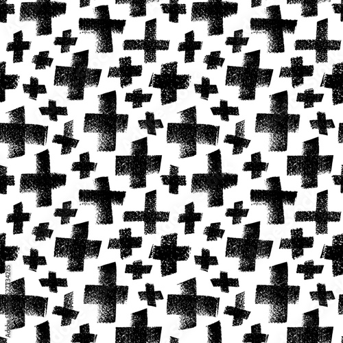 Seamless pattern with crosses of different sizes. Monochrome hand drawn vector print. Charcoal crosses with noise texture. Simple minimalistic geometric print. Black and white pattern with plus sign