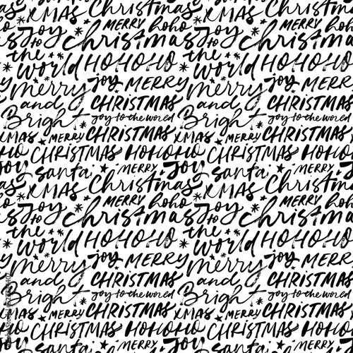 Seamless pattern with Christmas lettering. Winter holiday background with handwritten text. Brush style typography. Handwritten vector ornament. Merry Christmas hand lettering calligraphy.