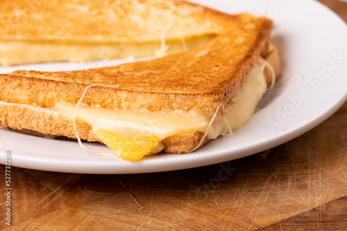 Close-up of fresh cheese sandwich toast served in plate