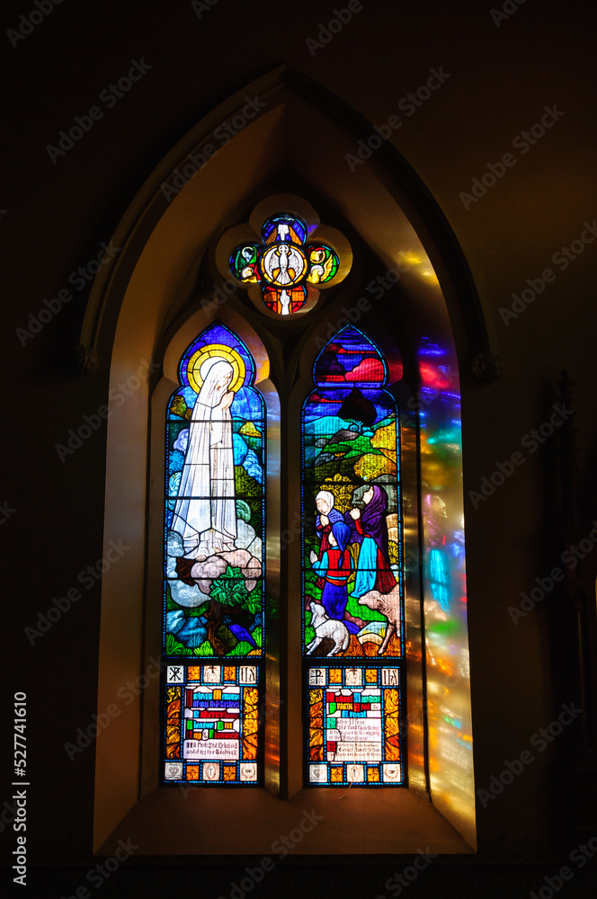 Stained glass window in Our Lady of the Rosary Catholic Church - Kyneton, Victoria, Australia