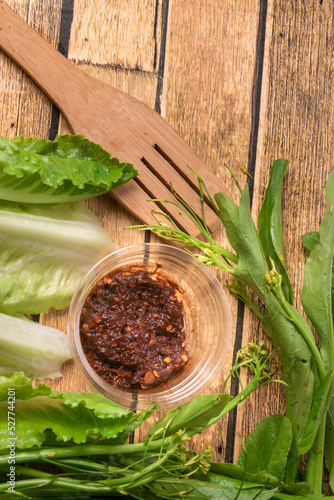 Asian street food chili paste  on the wooden floor  chili paste