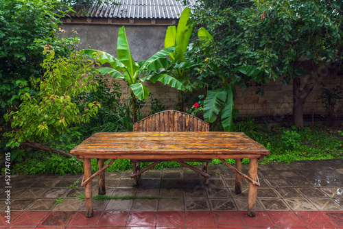 Old wet wooden table after rain