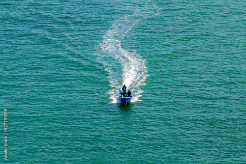 Blue speed boat in the sea near Koh Poh Island in Cambodia © Piseth