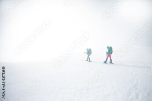 Hiking in snowshoes during a snowstorm