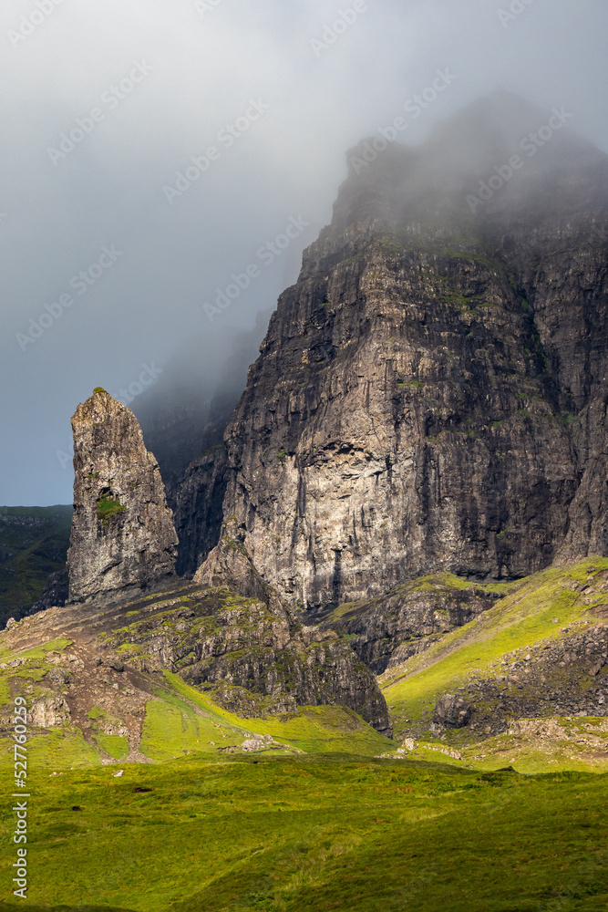 Sunny shining through the clouds at the old man of Storr on the Isle of Skye in Scotland