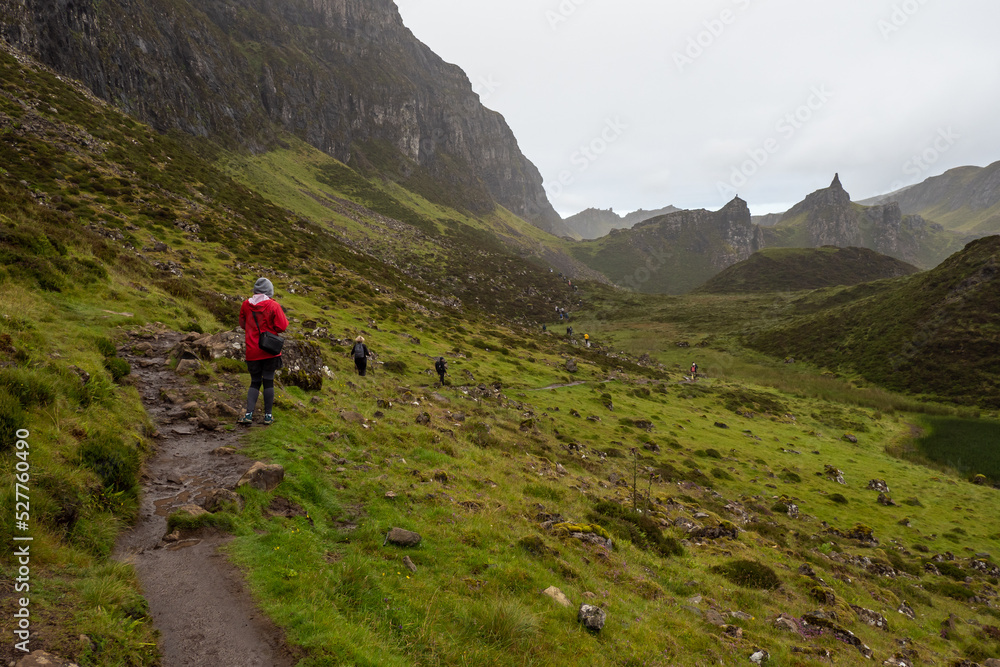 Female hiker hiking the Quiraing on the Isle of Skye in Scotland	