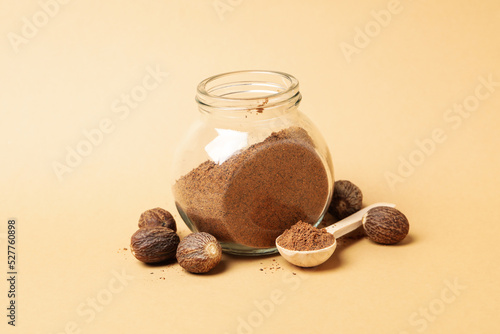 Concept of spices and condiments, nutmeg powder photo