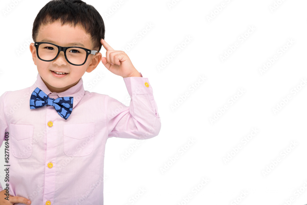 kid standing over white background smiling and pointing to head with one finger kid standing over white background smiling and pointing to head with one finger