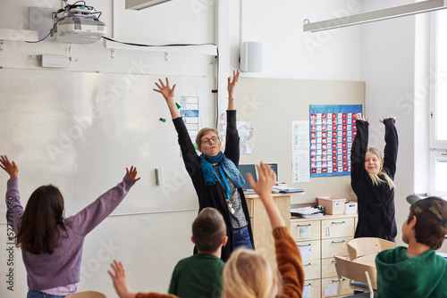 Teacher and children in classroom