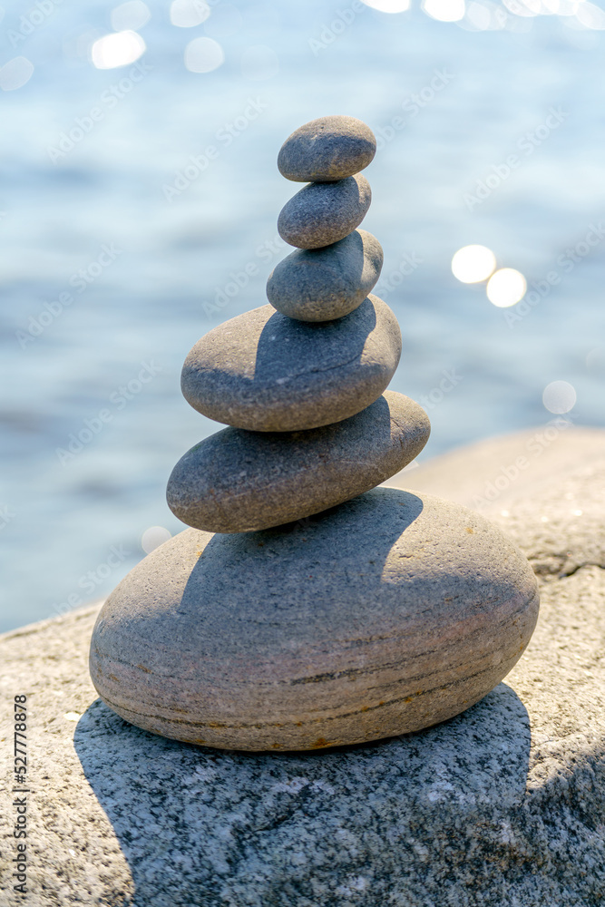 Pyramid of stones. Unstable balance of stone objects. Idyllic state of nature. Pyramid of stones. Unstable balance of stone objects. Idyllic state of nature.