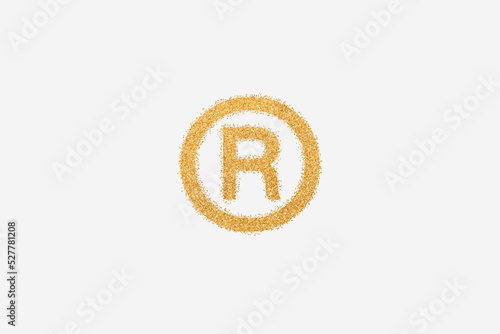 Registered trademark symbol made of golden glitter photo