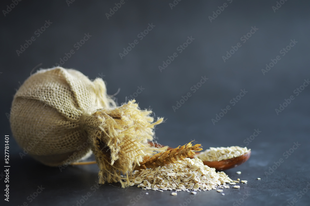 World grain crisis. A handful of cereals and on a dark background. World grain crisis. A handful of cereals and on a dark background.