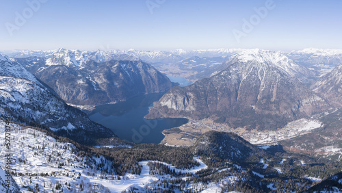 Amazing view on snowy winter alpine landscape with valley, mountains and lake, Austria, Europe