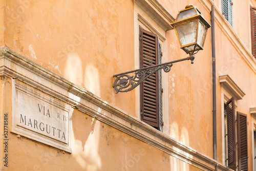 Via Margutta Street Sign in Rome. Famous for where Roman Holiday with Audrey Hepburn was shot. photo